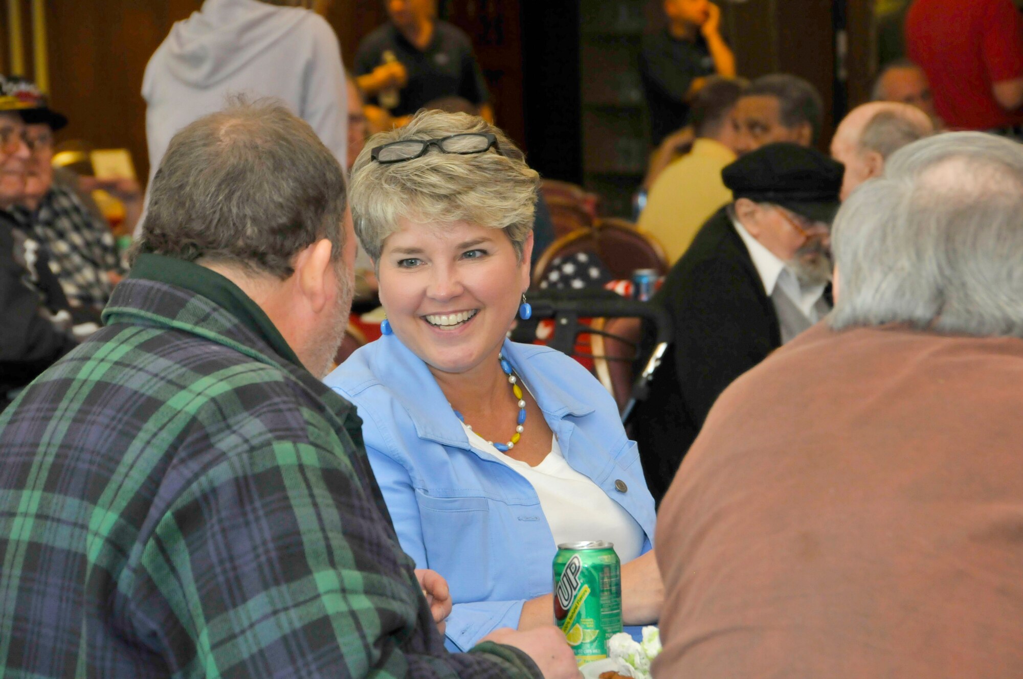 Michelle Sutton, a senior financial management specialist with the AEDC Financial Management and Comptroller Division, listens to a veteran during the annual AEDC veterans’ picnic October 2009. (U.S. Air Force photo/Rick Goodfriend)