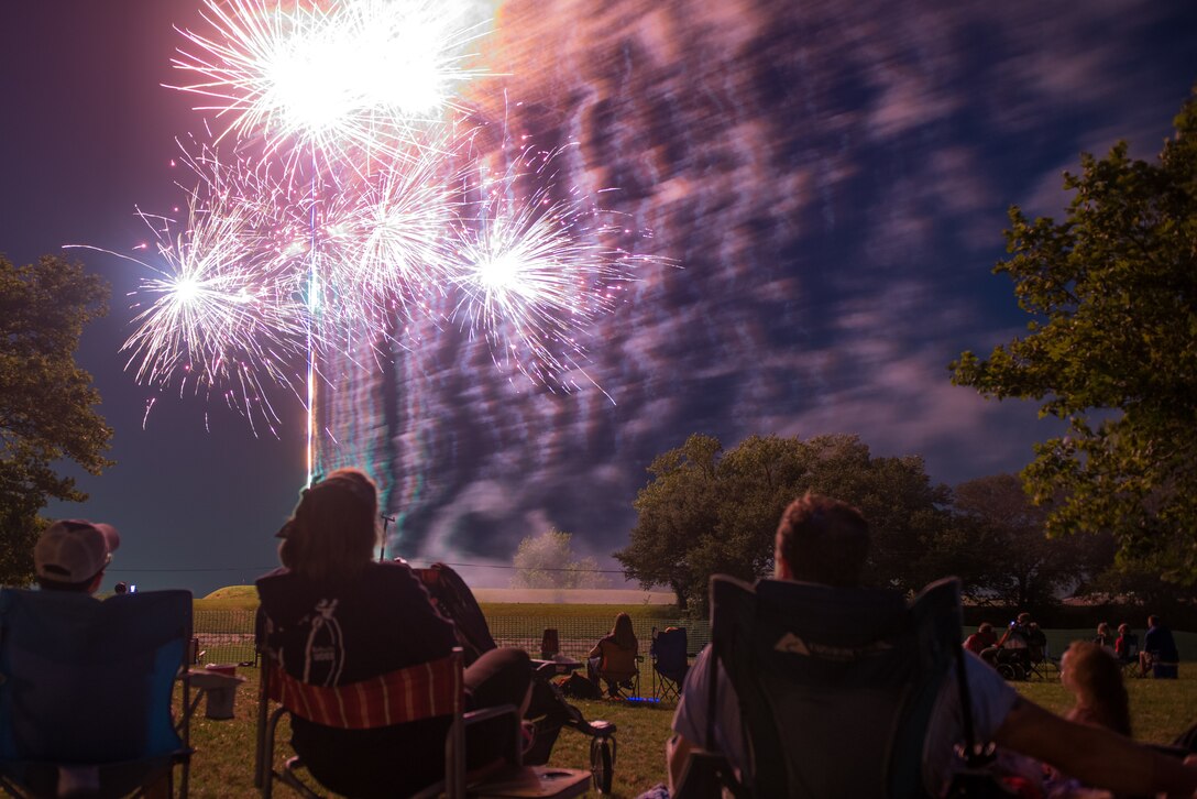 FORT MONROE, Va. -- Spectators watch fireworks at Fort Monroe during the Fourth on the Fort Independence Day Celebration at Fort Monroe, Va., July 4. Thousands of visitors packed the lawn for the event, which celebrated our national independence, 100 years of Airpower over Hampton Roads and 100 years of the U.S. Park Service. (U.S. Air Force photo/Master Sgt. Benjamin Wilson)