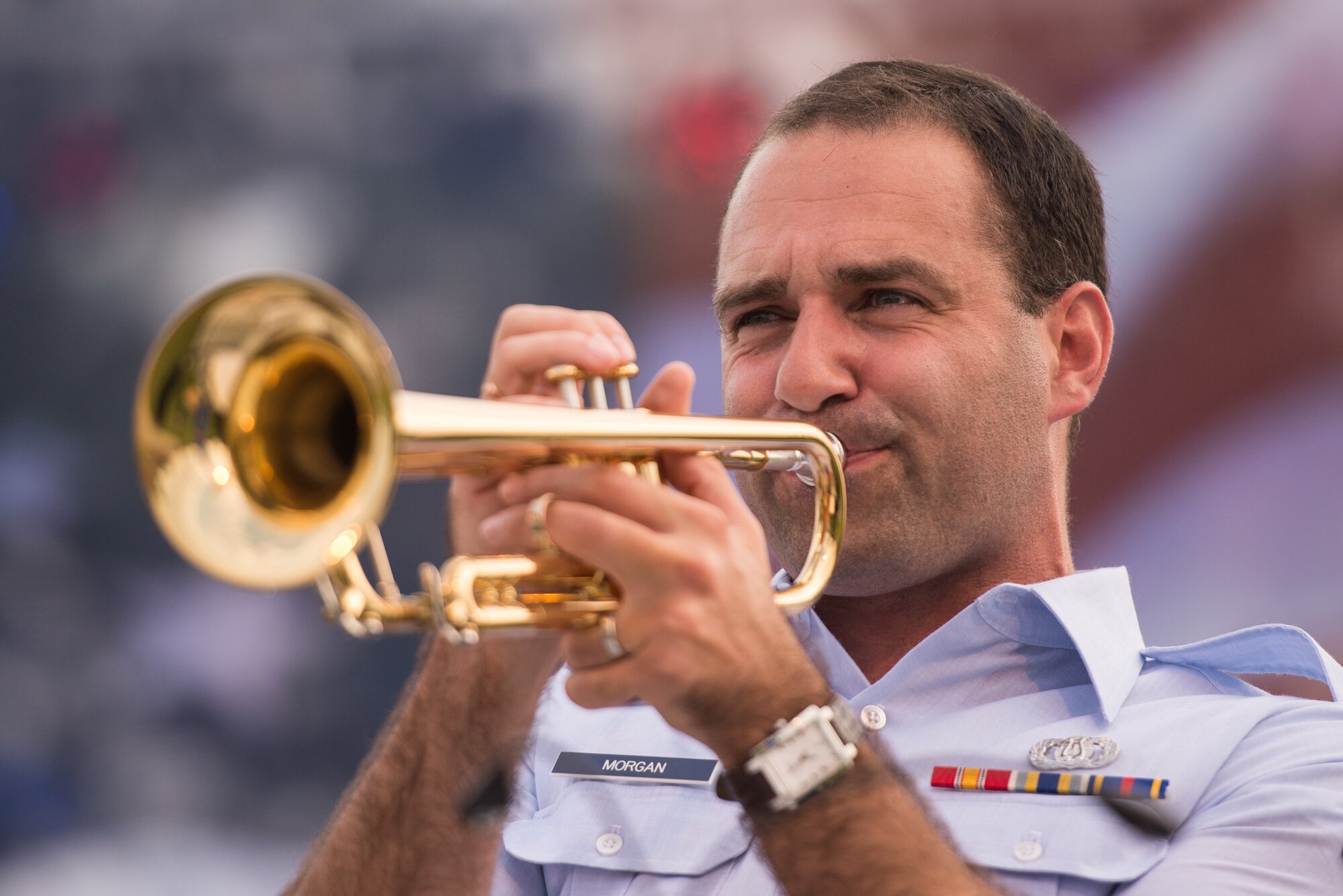 FORT MONROE, Va. -- U.S. Air Force Airman 1st Class Mark Morgan, U.S. Air Force Heritage of America Band trumpet player, belts out a solo during an Independence Day performance at Fort Monroe, Va., July 4. The band is celebrating its 75th anniversary this year. (U.S. Air Force photo/Master Sgt. Benjamin Wilson)