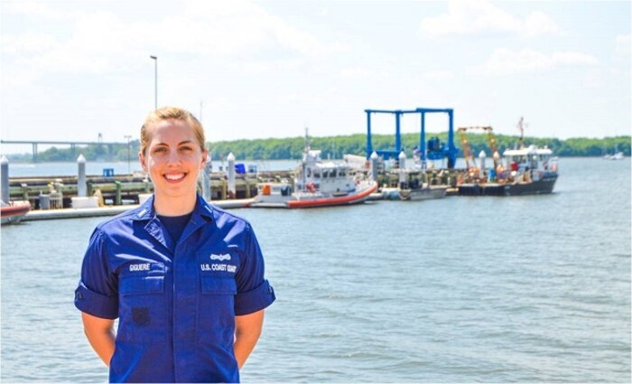 Lieutenant junior grade Cathleen Giguere stands on the pier at Coast Guard Sector Charleston Headquarters, Charleston, S.C. Giguere received the Capt. David H. Jarvis Award during the Navy League National Convention, June 17, 2016 in Charleston, S.C.(U.S. Coast Guard courtesy photo) 