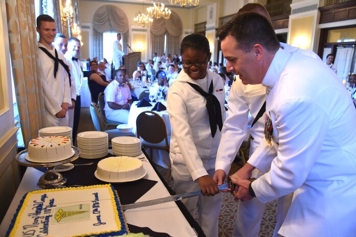 Naval Health Clinic Charleston hospital corpsmen cut a cake celebrating the
118th birthday of the Navy Hospital Corps during NHCC's Hospital Corpsman
Ball June 18, 2016 at the Francis Marion Hotel in Charleston, S.C. From left to right:
Seaman Apprentice Thamar Hayes, Seaman Recruit Kristian Townsend and Command
Master Chief R. Wade Miley. (Navy photo by Seaman Tiffany Tucker)
