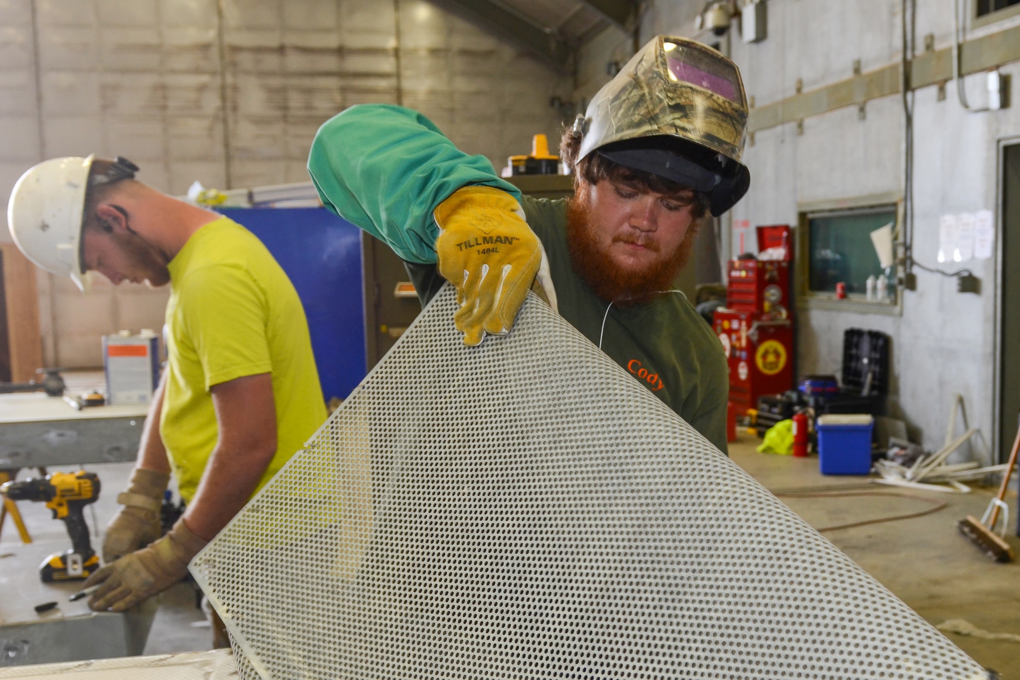 Civilian construction workers perform renovations on the South Carolina Air National Guard’s Enclosed Noise Suppression System Structure, or “hush house,” at McEntire Joint National Guard Base, S.C., March 10, 2016. The renovations occur approximately once every 10 years to keep the structure free of rust and other environmental elements that naturally occur over time. (U.S. Air National Guard photo by Airman 1st Class Megan Floyd)