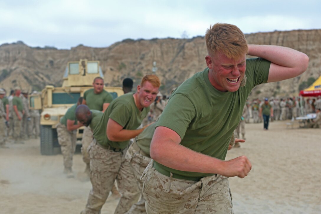 Marines assigned to 1st Light Armored Reconnaissance Battalion 1st Marine Division participate in timed Humvee pulls during the battalion’s Highlander Night at Marine Corps Base Camp Pendleton, Calif., June 30, 2016. Marine Corps photo by Lance Cpl. Timothy Valero