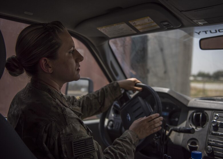 Tech. Sgt. Amy Saunders, 455th Expeditionary Operation Support Squadron, Detachment 1 airfield management liaison officer, drives out to the flightline to measure apron setbacks, July 1, 2016, Jalalabad Airfield, Afghanistan. Measuring apron setbacks is required to ensure wingtip clearance requirements are up to the standards. (U.S. Air Force photo by Senior Airman Justyn M. Freeman)
