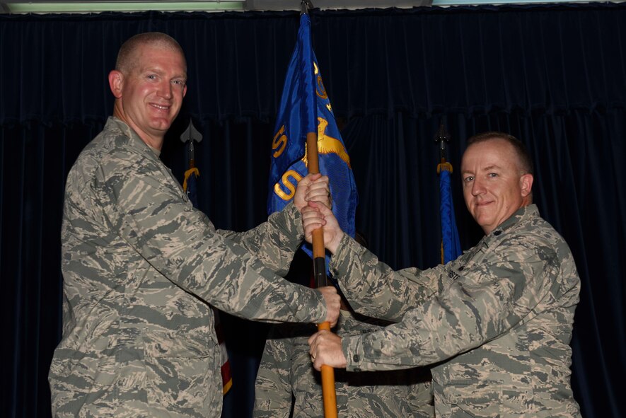 U.S. Air Force Lt. Col. Michael Kersten, 39th Medical Support Squadron incoming commander, recieves command from U.S. Air Force Col. John Walker, 39th Air Base Wing commander, July 7, 2016, at Incirlik Air Base, Turkey. Prior to taking command, Kersten was the director of operations, 86th Aeromedical Evacuation Squadron, Ramstein Air Base, Germany. (U.S. Air Force photo by Airman 1st Class Devin M. Rumbaugh/Released)