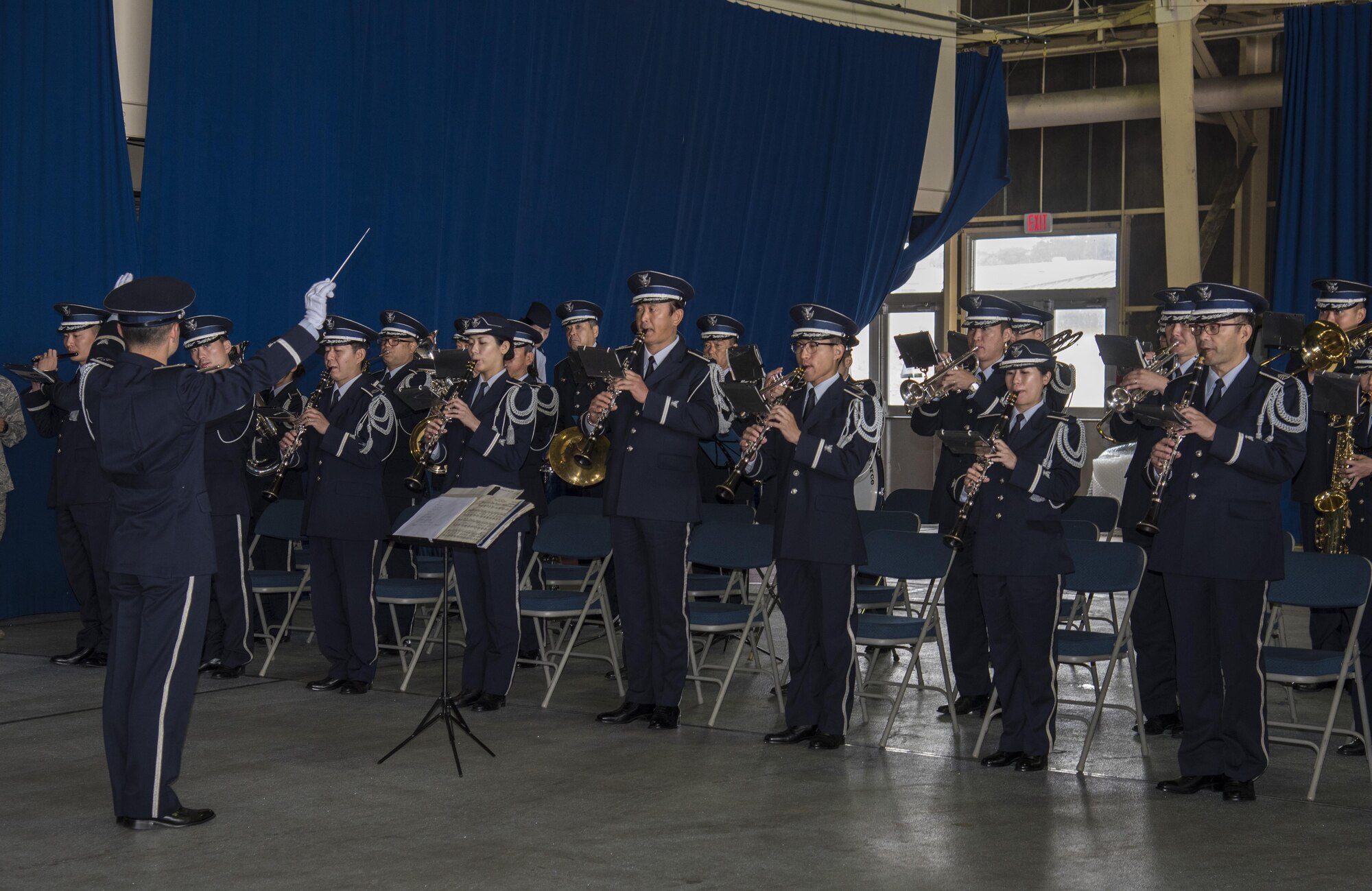 The Japan Air Self-Defense Force band plays during the 35th Fighter Wing change of command ceremony at Misawa Air Base, Japan, July 7, 2016. The ceremony was held to formally showcase the transfer of wing leadership from U.S. Air Force Col. Timothy Sundvall to Col. R. Scott Jobe. (U.S. Air Force photo by Senior Airman Jordyn Fetter)