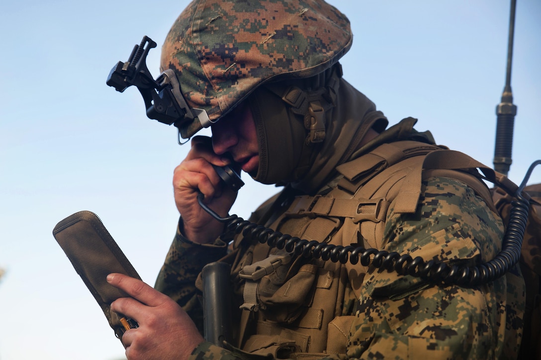 Marine Corps Cpl. Clayton L. Campbell communicates with the combat operations center during Exercise Hamel at Cultana Training Area, Australia, July 1, 2016. Campbell is a field radio operator assigned to Alpha Company, 1st Battalion, 1st Marine Regiment, Marine Rotational Force Darwin. Marine Corps photo by Cpl. Carlos Cruz Jr.