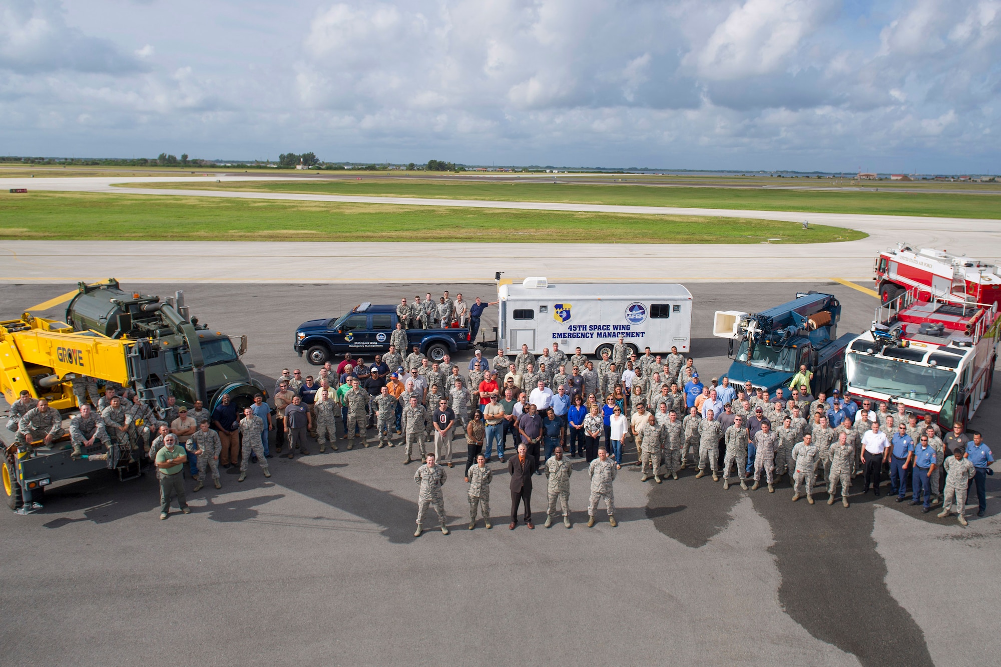 Members of the 45th Civil Engineer Squadron pose for a group photo in November 2015 at Patrick Air Force Base, Fla. The group won Air Force Space Command’s Outstanding Large Civil Engineer Unit Award for 2015 plus four other unit awards and ten individual awards. Three members were recognized at the Air Force level. (U.S. Air Force photo by Matthew Jurgens/Released) 
