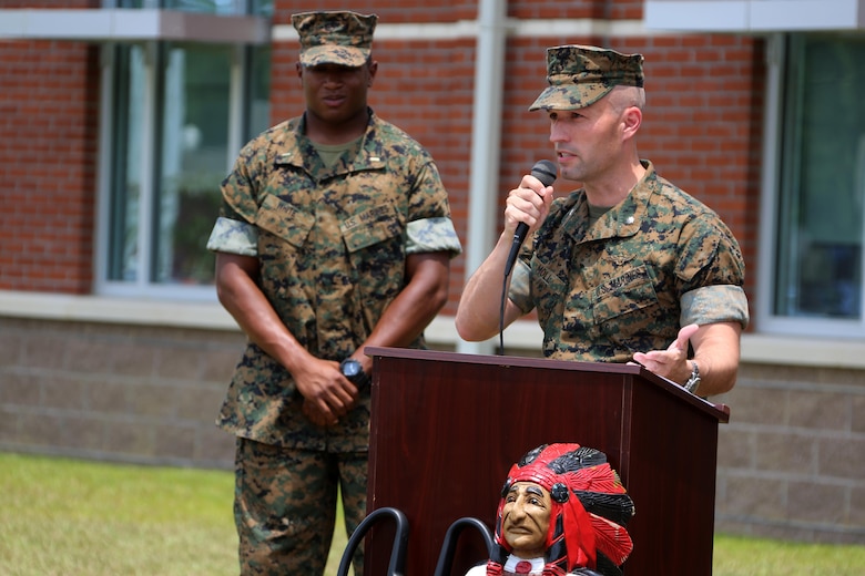 Lt. Col. Brian Moll addresses a crowd during a ribbon cutting ceremony at Marine Corps Air Station Cherry Point, N.C., June 24, 2016. Marine  Air Support Squadron 1 received a new, state-of-the-art facility to support several of its units, including the communications, electronics, headquarters and service, and air support company, as well as the unit’s supply section. The complex, which represents a new era of technology for the squadron and the Marine Corps, supports better quality training operations using a new battle lab capable of recreating realistic training missions with outside entities or other communications assets. MASS-1 is an aviation command and control unit responsible for the planning, receiving, coordination, processing of requests for direct or close air support. Moll is the MCAS Cherry Point executive officer. (U.S. Marine Corps photo by Cpl. N.W. Huertas/Released)