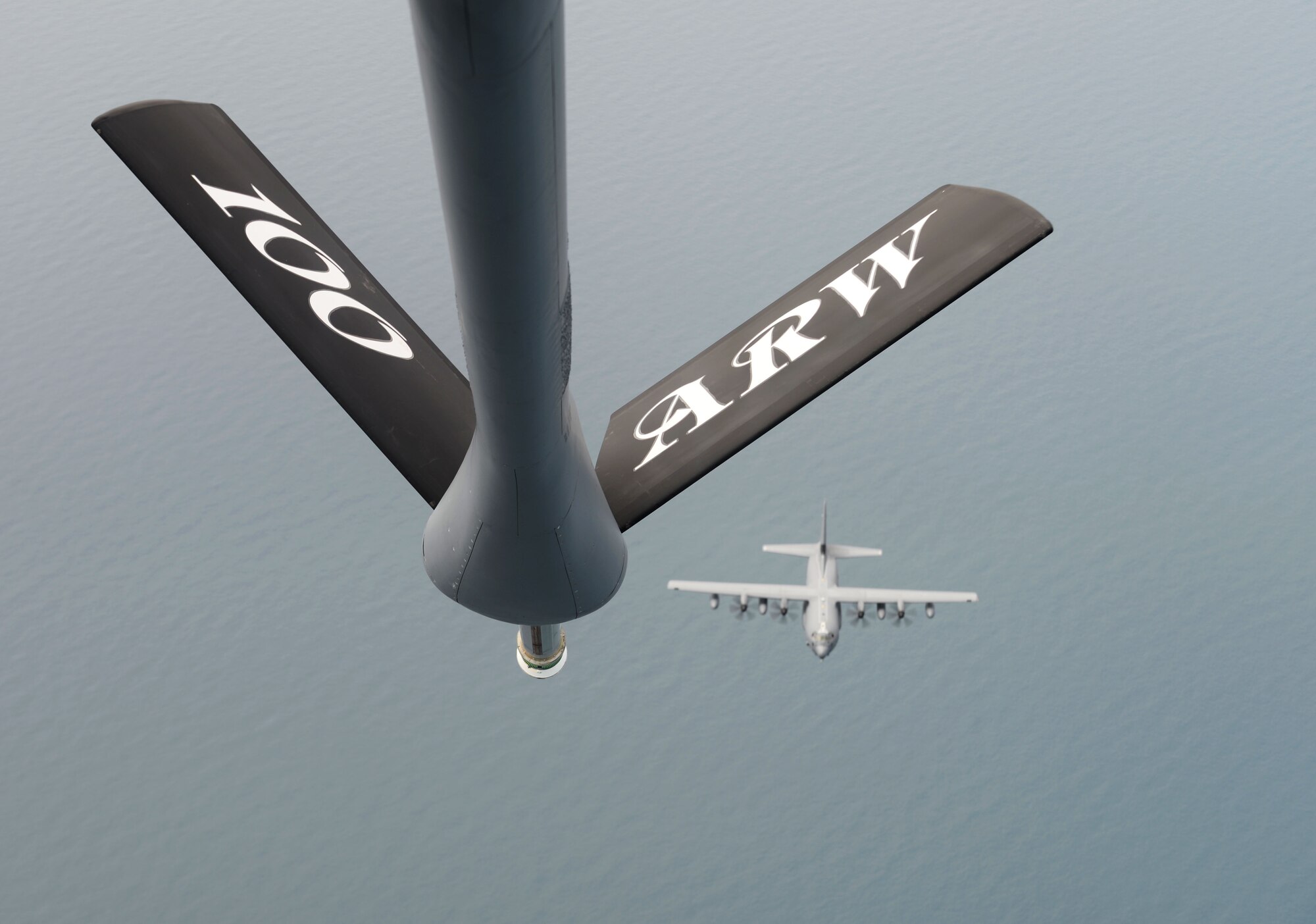 A KC-135 Stratotanker, flown by U.S. Air Force Col. Thomas Torkelson, 100th Air Refueling Wing commander, prepares to pass gas to an MC-130J Commando II, flown by U.S. Air Force Col. William Holt, 352d Special Operations Wing commander, July 6, 2016, above the North Sea. This flight served as Holt’s final flight while stationed at RAF Mildenhall. (U.S. Air Force photo by Airman 1st Class Tenley Long/Released) 