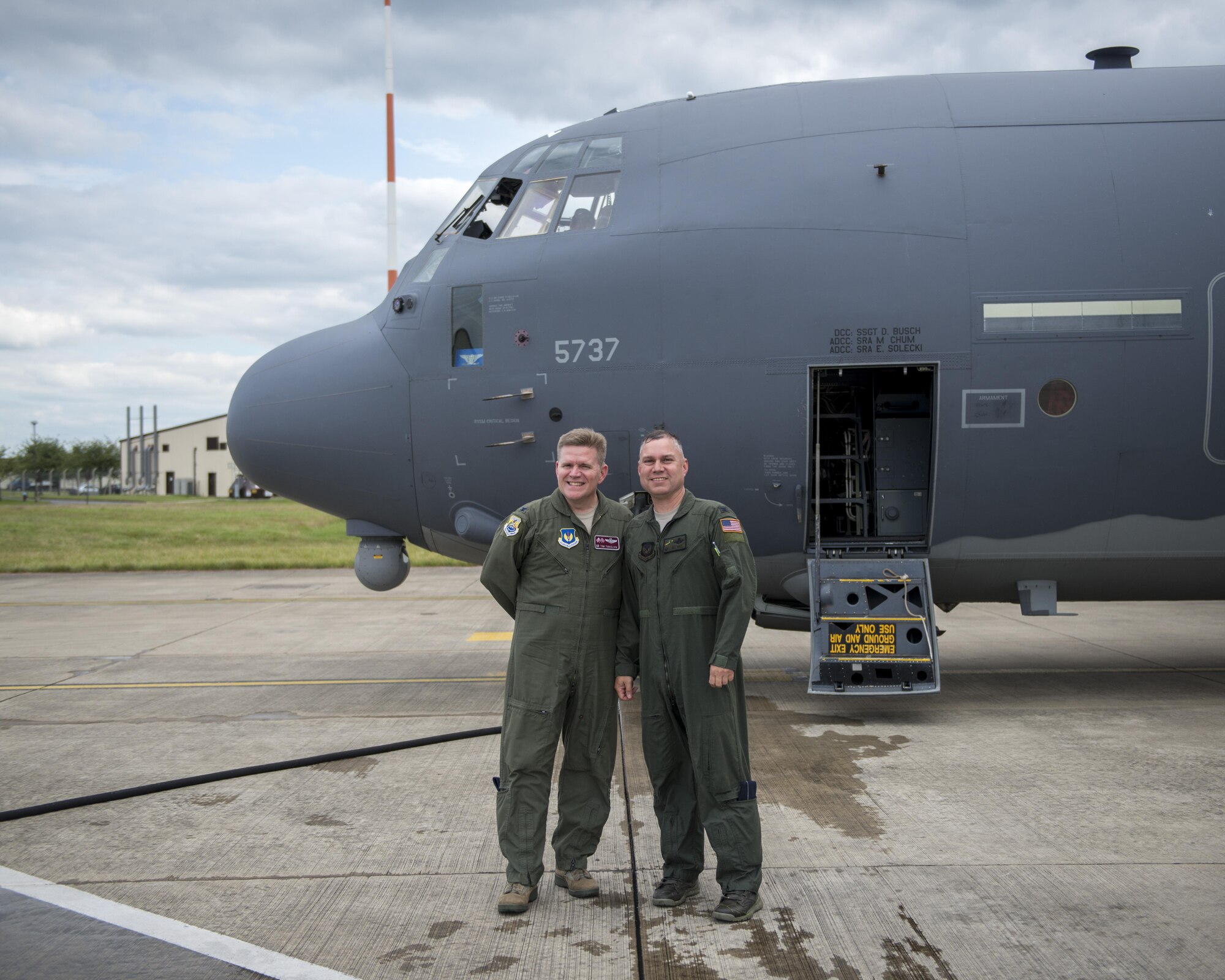 U.S. Air Force Col. William Holt, 352d Special Operations Wing commander and Col. Thomas Torkelson, 100th Air Refueling Wing commander pose for a photo on RAF Mildenhall after a flight, July 6, 2016.  During the flight, Torkelson piloted a KC-135 Stratotanker which refueled an MC-130J Commando II piloted by Holt. This flight served as Holt’s final flight while stationed at RAF Mildenhall and showcased the strong bond between the two collocated units. (U.S. Air Force photo by 1st Lt Chris Sullivan/Released)