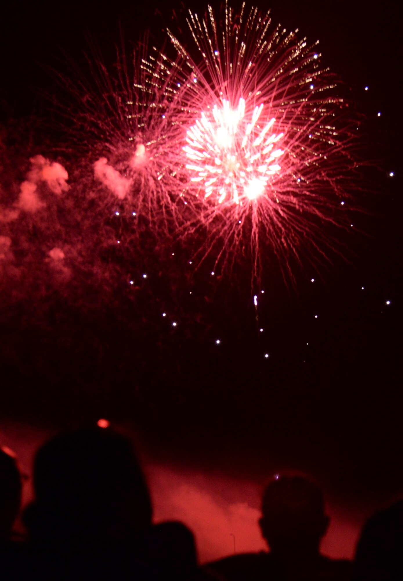 Families watch the fireworks display during the 2016 Fireworks on the Water July 1 at the Stennis Lock and Dam in Columbus, Mississippi. The show lasted for 18 minutes and concluded with a final volley of fireworks. (U.S. Air Force photo/Airman 1st Class John Day) 