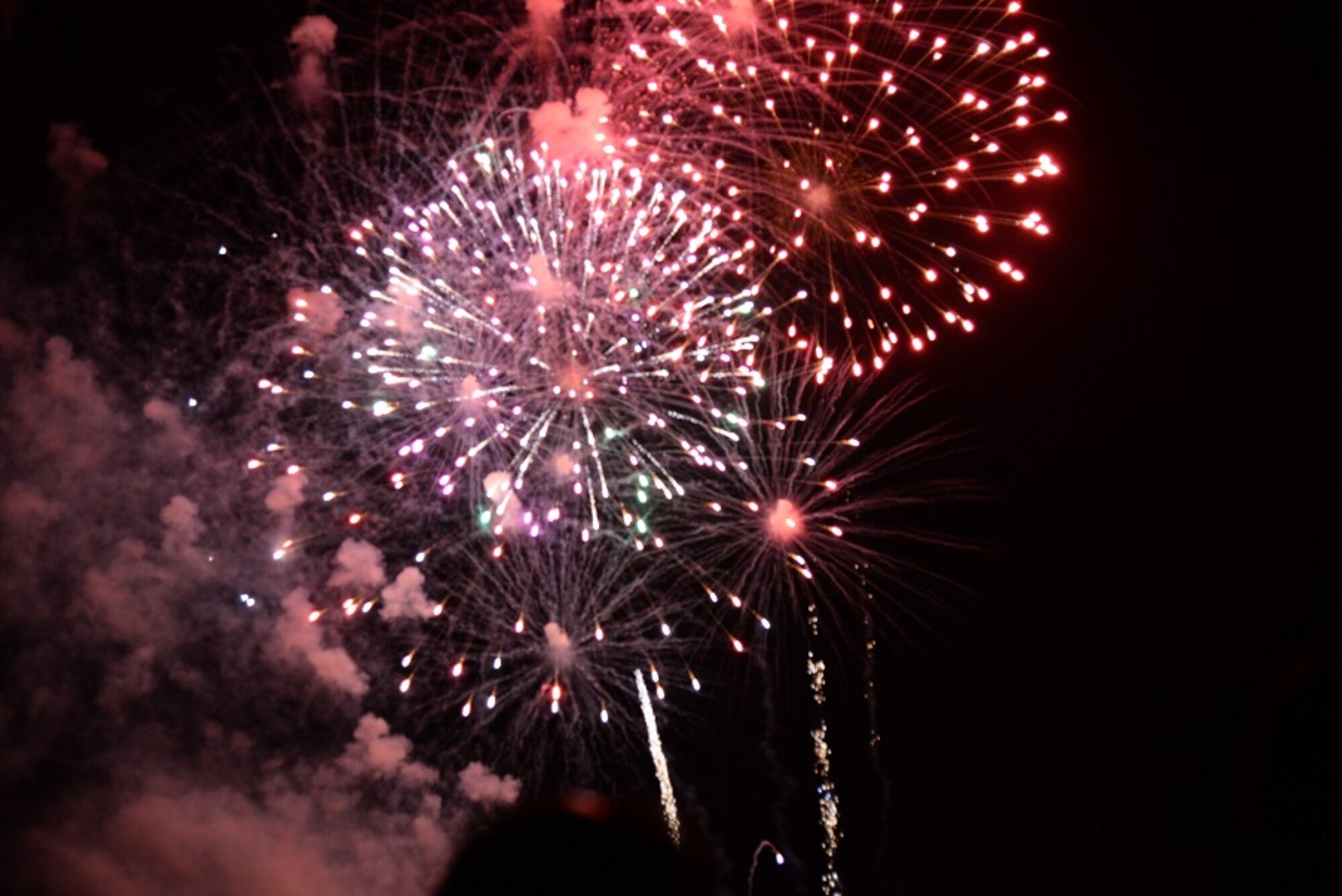 Attendees gather around the stage to dance along to Danika Portz, pop and country music singer, who performed during the 2016 Fireworks on the Water July 1 at the Stennis Lock and Dam in Columbus, Mississippi. Johnny Coleman and Swing Shift, a local Mississippi band, opened for before a speech from the Honorable Robert Smith, Mayor of Columbus, Col. John Nichols, 14th Flying Training Wing Commander, and then Portz’ performance. (U.S. Air Force photo/Airman 1st Class John Day)