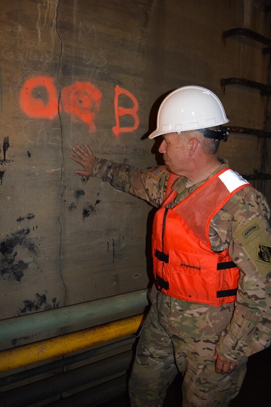 Lt. Gen. Todd Semonite, USACE commanding general and chief of engineers, looks at an infrastructure challenge in the middle wall at Montgomery Locks and Dam on the Ohio River, June 22.