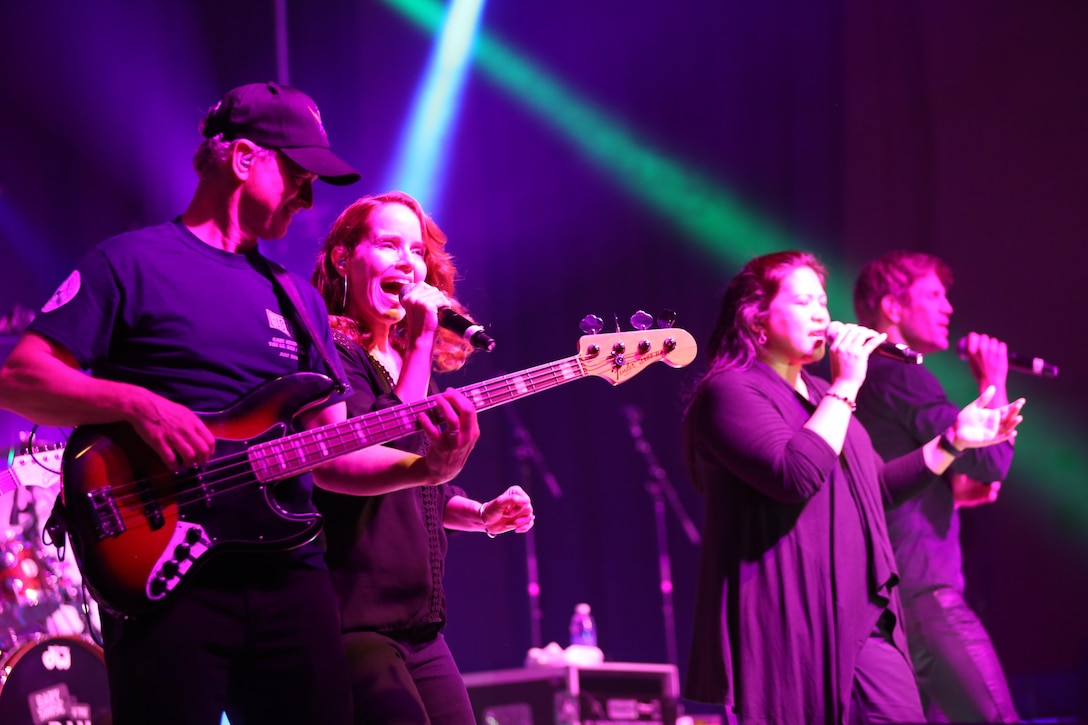 Gary Sinise and the Lt. Dan Band perform songs from all different genres on the Two Rivers Theater stage at Marine Corps Air Station Cherry Point, N.C., July 5, 2016. Gary Sinise and the Lt. Dan Band have participated in 70 United Service Organization tours since they came together. In total, they have entertained more than 363,000 service members and military families in 13 countries. The band puts on shows to raise spirits, funds and awareness for severely wounded warriors in need. (U.S. Marine Corps photo by Lance Cpl. Mackenzie Gibson/Released)