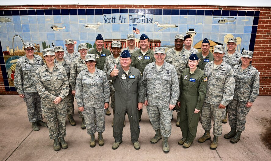 Brig. Gen. Samuel "Bo" Mahaney, Reserve Deputy Director, Director of Operations, Air Mobility Command, Scott Air Force Base, Illinois gives the thumbs up and gets big smiles from the 932nd Airlift Wing leadership during a quick photo opportunity, July 7, Scott Air Force Base, Illinois.  Mahaney gave an update to current command issues for the Air Force Reserve Command and shared some of his career highlights during the opening of day two of the Commander's Professional Development Seminar for the 932nd AW  commanders. (U. S. Air Force photo/Christopher Parr)