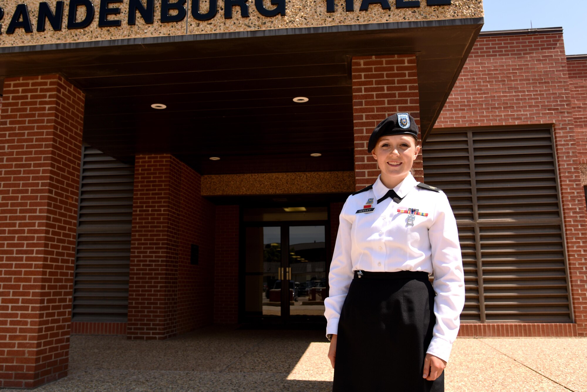 U.S. Army Sgt. Alicia Seeley, 316th Training Squadron student, stands in front of Brandenburg Hall on Goodfellow Air Force Base, Texas, July 1, 2016. Seeley is the Goodfellow Student of the Month Spotlight for June, 2016, a series highlighting Team Goodfellow students. (U.S. Air Force photo by Senior Airman Joshua Edwards/Released)
