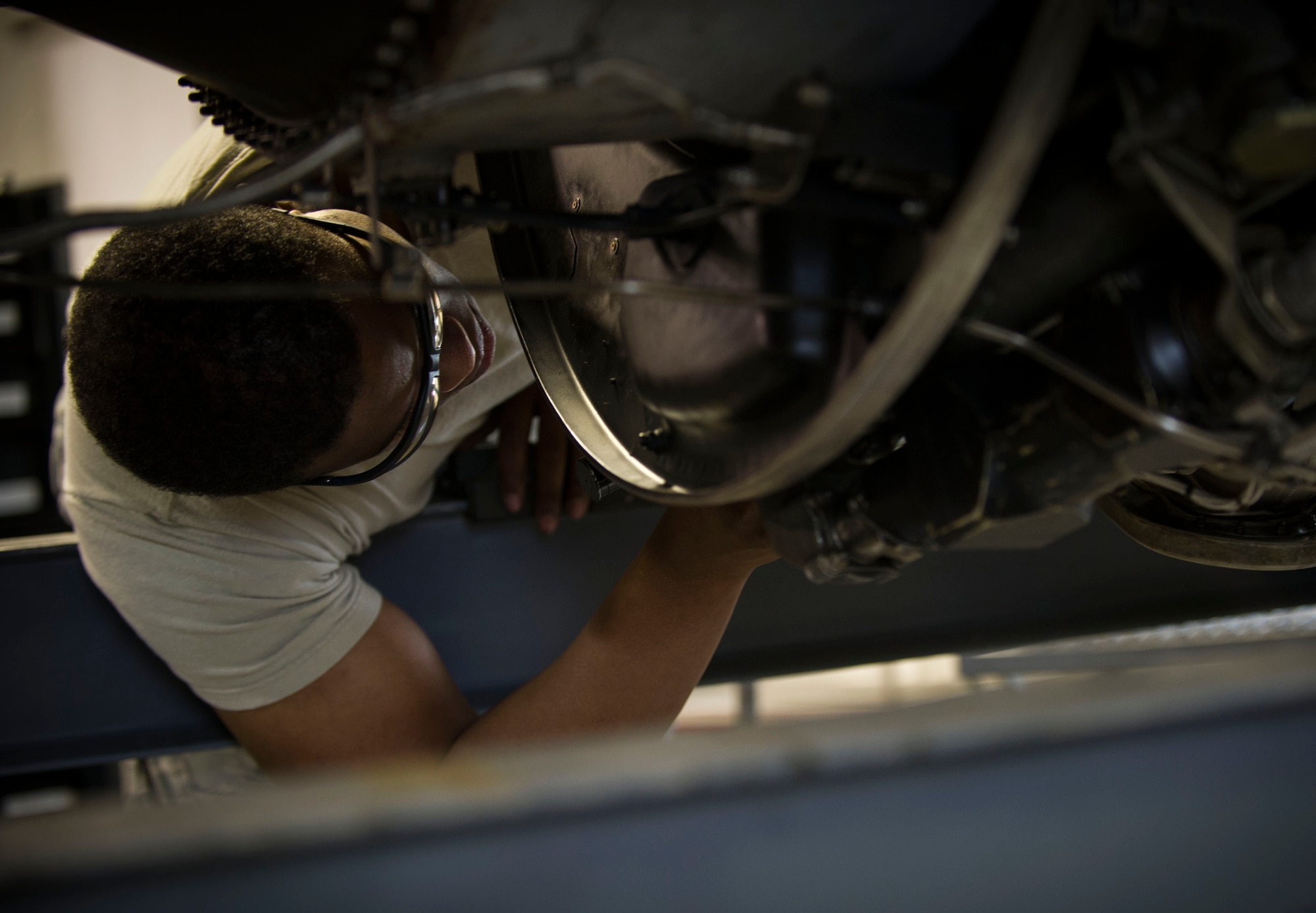 Staff Sgt. Korie Parker, 5th Maintenance Group engine trending and diagnostic monitor, inspects a B-52 combine engine at Minot Air Force Base, N.D., July 5, 2016. ET&D monitors are responsible for maintaining over 200 engines at Minot AFB. (U.S. Air Force photo/Senior Airman Apryl Hall)