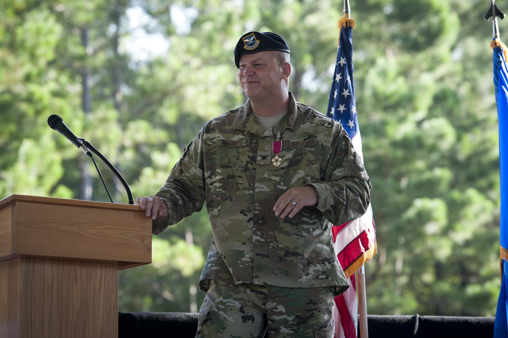 U.S. Air Force Col. Michael Ross, outgoing 820th Base Defense Group commander, speaks during a change of command ceremony, July 7, 2016, at Moody Air Force Base, Ga. After relinquishing command, Ross and his wife Mandy will travel to South Korea to become the United States Forces Korea director of force protection. (U.S. Air Force photo by Airman 1st Class Lauren M. Hunter/Released)