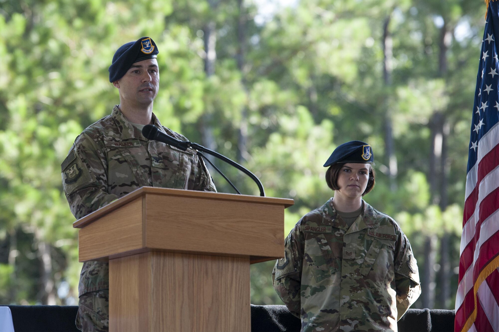 U.S. Air Force Col. Kevin Walker, incoming 820th Base Defense Group commander, speaks during a change of command ceremony, July 7, 2016, at Moody Air Force Base, Ga. Walker has served as the commander of the 379th Security Forces Squadron at Al Udeid AB, Quatar, as well as the commander of the 374th SFS at Yokota AB, Japan . (U.S. Air Force photo by Airman 1st Class Lauren M. Hunter/Released)