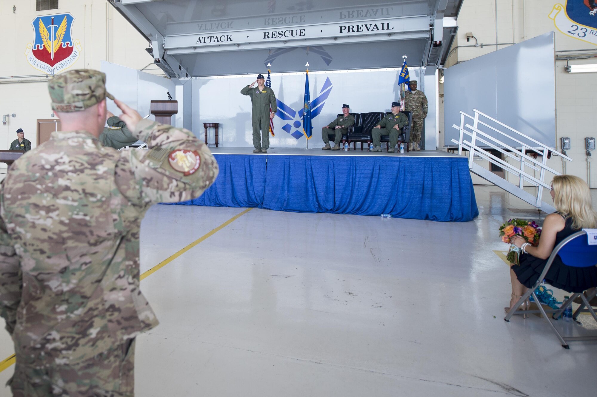 U.S. Air Force Lt. Col. Ryan Hill, 81st Fighter Squadron incoming commander, salutes Airmen from the 81st FS during a change of command ceremony, July 7, 2016, at Moody Air Force Base, Ga. Hill assumed command after working as the squadron’s director of operations for 18 months. (U.S. Air Force photo by Senior Airman Ceaira Tinsley/ Released)