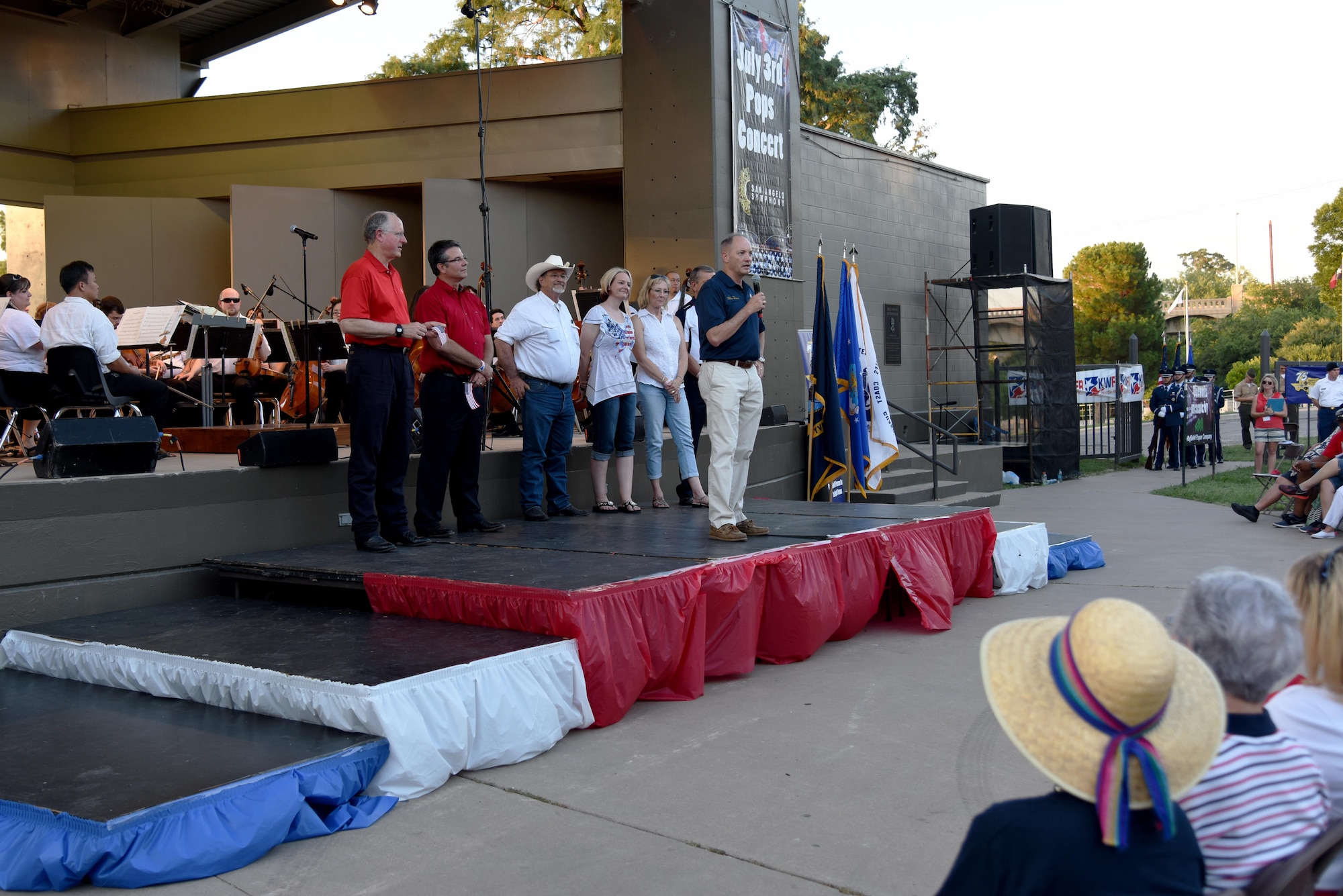 U.S. Air Force Col. Michael Downs, 17th Training Wing Commander, speaks during the 29th Annual San Angelo Symphony’s July 3rd Pops Concert at the Bill Aylor Sr. Memorial RiverStage in San Angelo, Texas, July 3, 2016. Col. Downs spoke about the relationship between San Angelo and Goodfellow, and why Independence Day is important. (U.S. Air Force photo by Senior Airman Joshua Edwards/Released) 