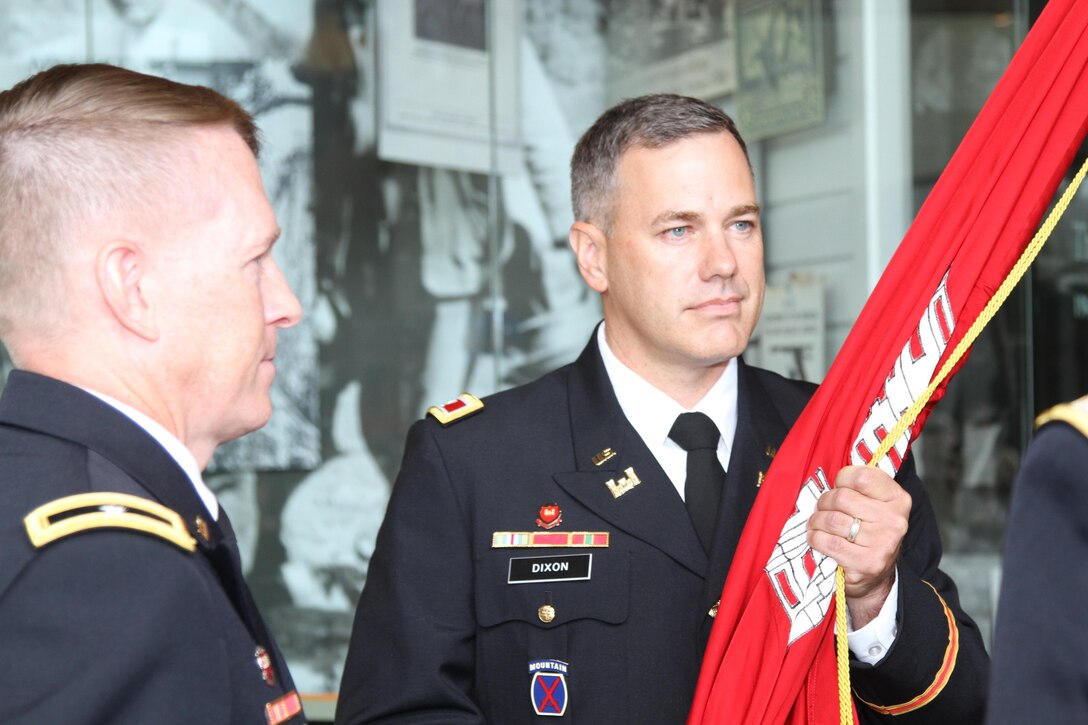 Col. Robert Dixon (right) holds the Army Corps of Engineers flag, and with it command of the Corps’ Little Rock District, as Brig. Gen. David C. Hill, the Corps’ Southwestern Division Commander looks on during the district change of command ceremony.  The event was held July 7 at the Witt Stephens Jr. Central Arkansas Nature Center in downtown Little Rock.  (Photo courtesy of the Army Corps of Engineers)  