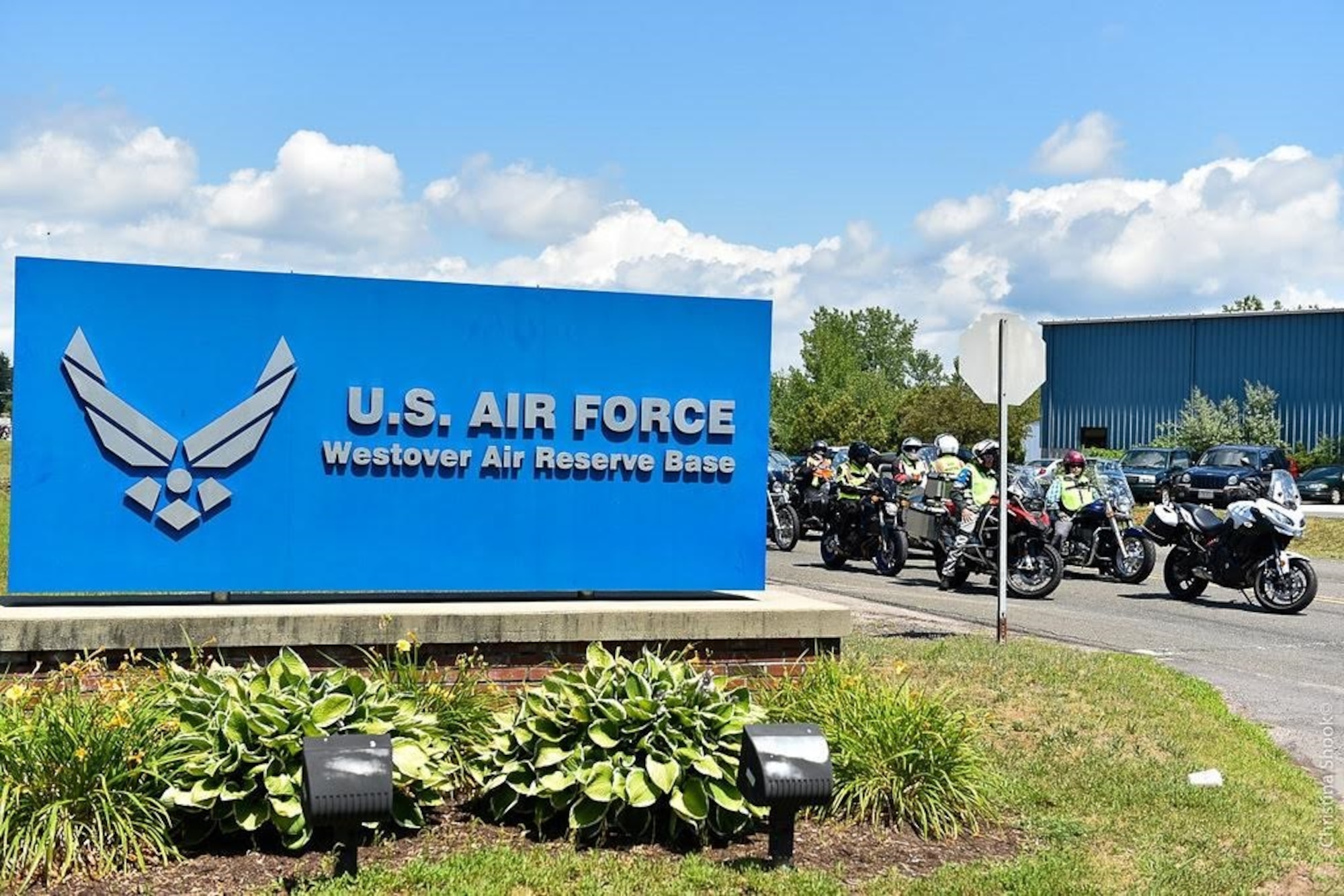 Nearly 75 members of the local community, family, friends, military members and motorcycle enthusiasts came together to kick off a cross-country motorcycle journey in celebration of the 100th anniversary of the Van Buren sisters ride from New York to California in 1916. (U.S. Air Force courtesy photo)