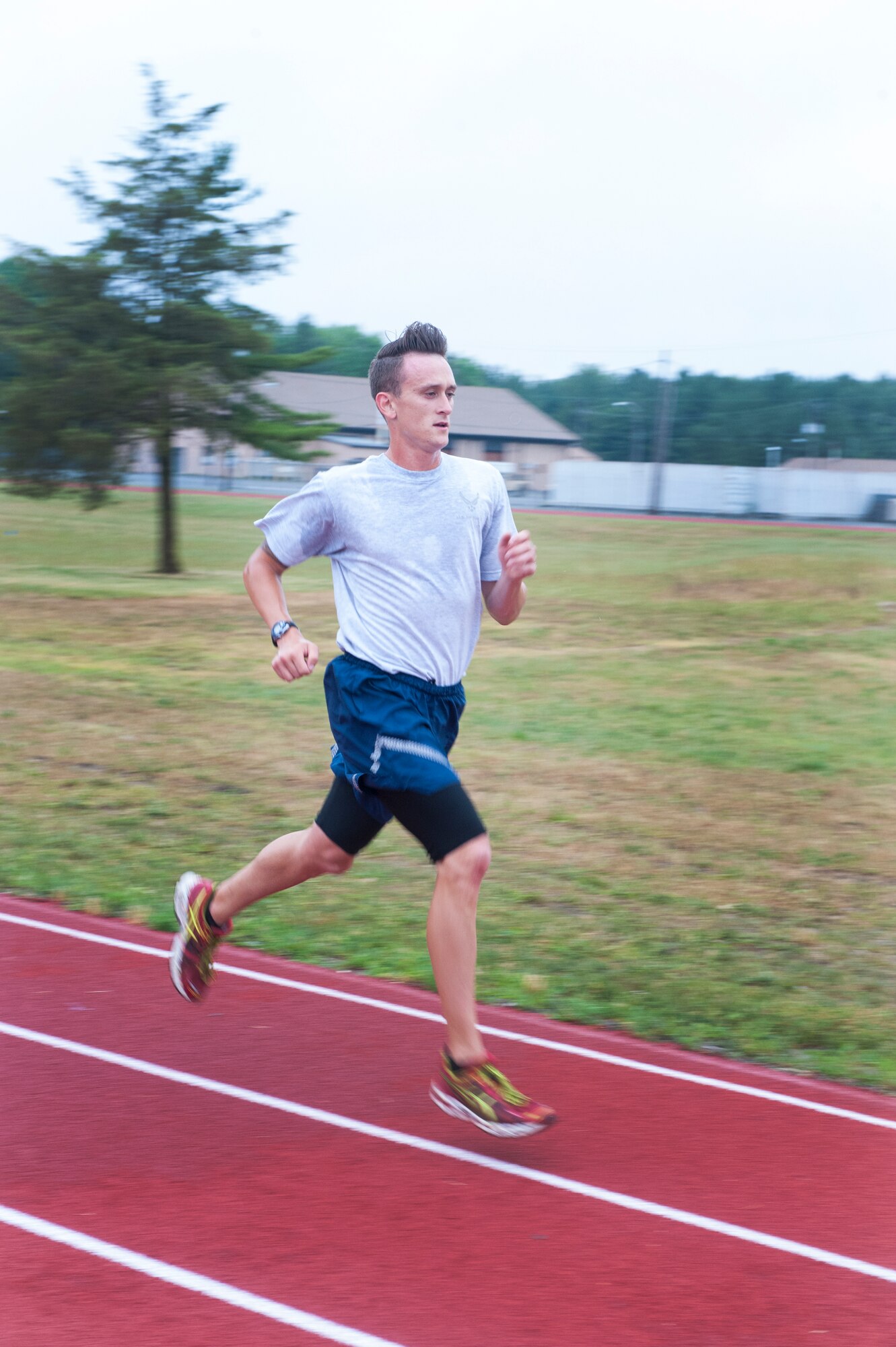 Airman 1st Class Collin White, a 305th Operations Support Squadron air traffic controller, sprints the entire 2-mile run in under 12 minutes during the physical fitness assessment portion of the service member of the year competition at Joint Base-McGuire-Dix-Lakehurst, New Jersey, June 28, 2016. After completing the 2-mile run, competitors participated in a 3.5-mile ruck march.

