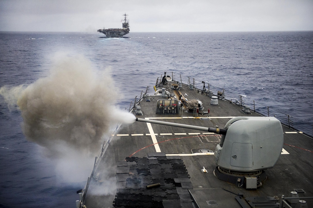 The guided-missile destroyer USS Gonzalez fires a lightweight gun during a live-fire gunnery exercise in the Atlantic Ocean, July 4, 2016. The Gonzalez is supporting maritime security operations and theater security cooperation efforts. Navy photo by Petty Officer 3rd Class Pasquale Sena