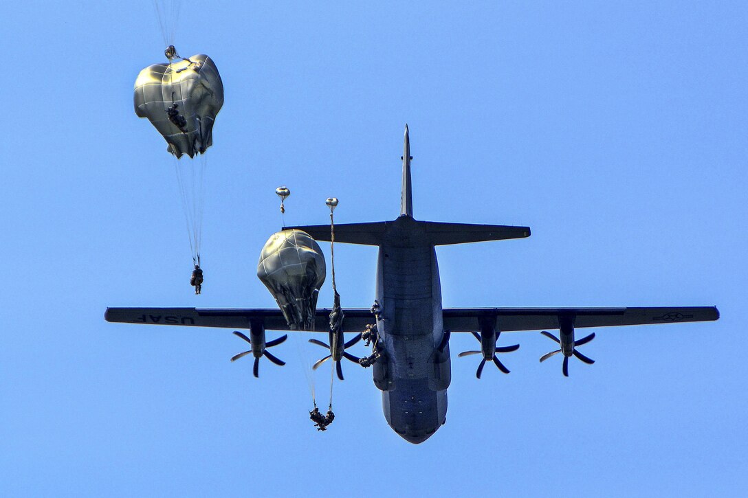 Paratroopers jump over Frida drop zone from a C-130 Hercules aircraft during airborne training in Pordenone, Italy, June 29, 2016. Army photo by Paolo Bovo