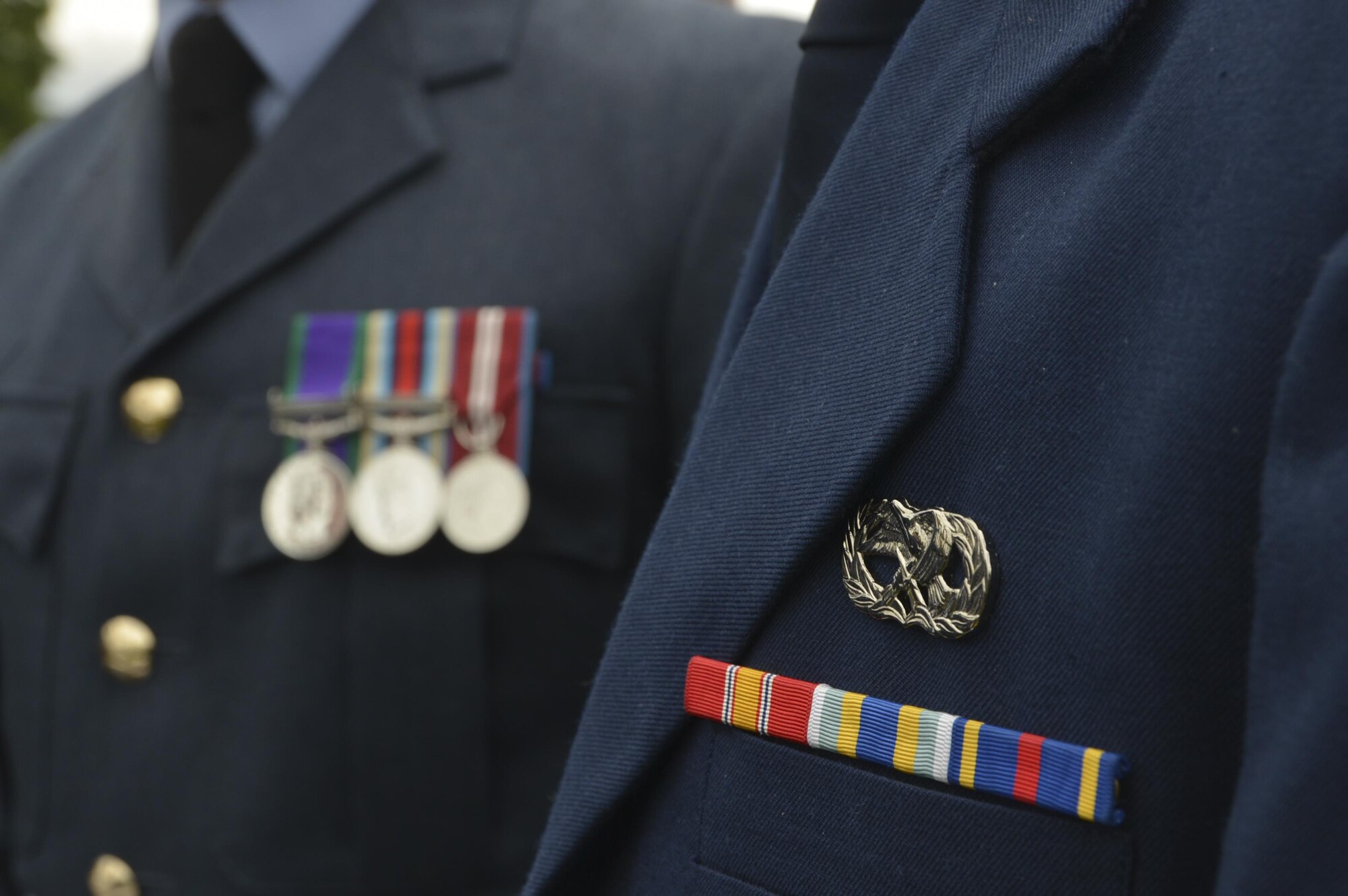 Royal Air Force members from the U.S. and U.K. stand side by side during the Royal Norfolk Show in Norfolk, England, June 30. Members from U.S. Air Force used downtime before marching to talk with U.K. partners. (U.S. Air Force photo/Senior Airman Nigel Sandridge)
