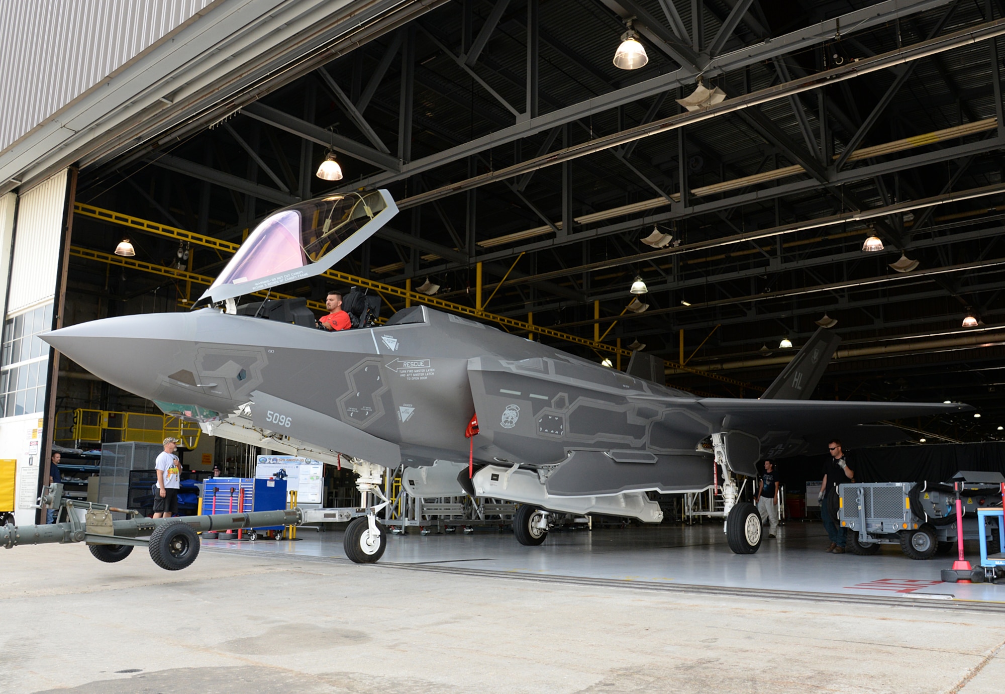 The twelfth F-35A Lightning II aircraft needed to declare initial operational capability (IOC) emerges from a repair hangar after depot and unit-level modifications were completed June 30, 2016 at Hill Air Force Base, Utah. The modifications were needed to correct an overpressure condition in the fuel system during elevated G-maneuvers and fuel migration between internal fuel tanks. (U.S. Air Force Photo by Alex R. Lloyd)