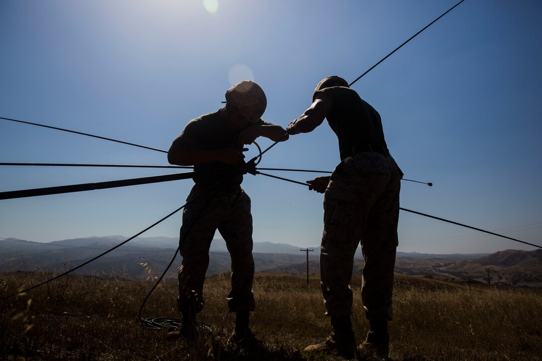 MARINE CORPS BASE CAMP PENDLETON, Calif. – Marines with Headquarters Platoon, Koa Moana 16-4, set up an antenna during counter improvised explosive device training on Camp Pendleton June 23, 2016. Koa Moana seeks enhance senior military leader engagements between allied and partner nations with a collective interest in military-to-military relations, as well as discuss key aspects of military operations, capability development, and interoperability. (U.S. Marine Corps photo by Sgt. Tony Simmons)