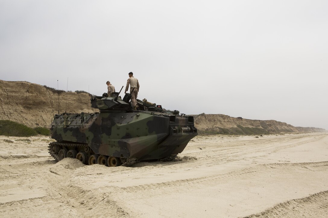 Marines with Headquarters and Service Company, 3D Assault Amphibian Battalion, 1st Marine Division, conduct amphibious combat sustainment training near White Beach aboard Marine Corps Base Camp Pendleton, Calif., June 38-30, 2016. The exercises helped leaders within 3D AA Bn. evaluate their newer Marines while ensuring their own skills remain sharp. The battalion is charged with forcible entry and ship-to-shore transportation of the ground combat element of I Marine Expeditionary Force. (U.S. Marine Corps photo by Sgt. Jacob D. Osborne/Released)