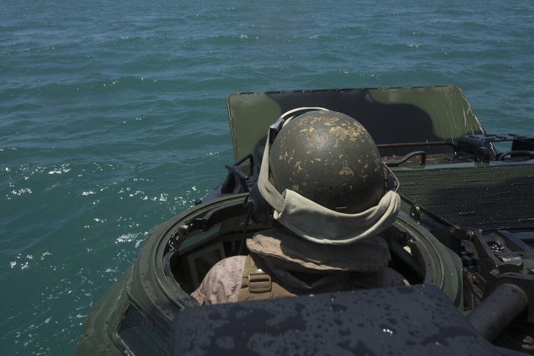 Marines with Headquarters and Service Company, 3D Assault Amphibian Battalion, 1st Marine Division, conduct amphibious combat sustainment training near White Beach aboard Marine Corps Base Camp Pendleton, Calif., June 38-30, 2016. The exercises helped leaders within 3D AA Bn. evaluate their newer Marines while ensuring their own skills remain sharp. The battalion is charged with forcible entry and ship-to-shore transportation of the ground combat element of I Marine Expeditionary Force. (U.S. Marine Corps photo by Sgt. Jacob D. Osborne/Released)