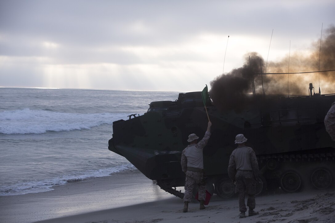 Marines with Headquarters and Service Company, 3D Assault Amphibian Battalion, 1st Marine Division, conduct amphibious combat sustainment training near White Beach aboard Marine Corps Base Camp Pendleton, Calif., June 38-30, 2016. The exercises helped leaders within 3D AA Bn. evaluate their newer Marines while ensuring their own skills remain sharp. The battalion is charged with forcible entry and ship-to-shore transportation of the ground combat element of I Marine Expeditionary Force. (U.S. Marine Corps photo by Sgt. Jacob D. Osborne/Released)