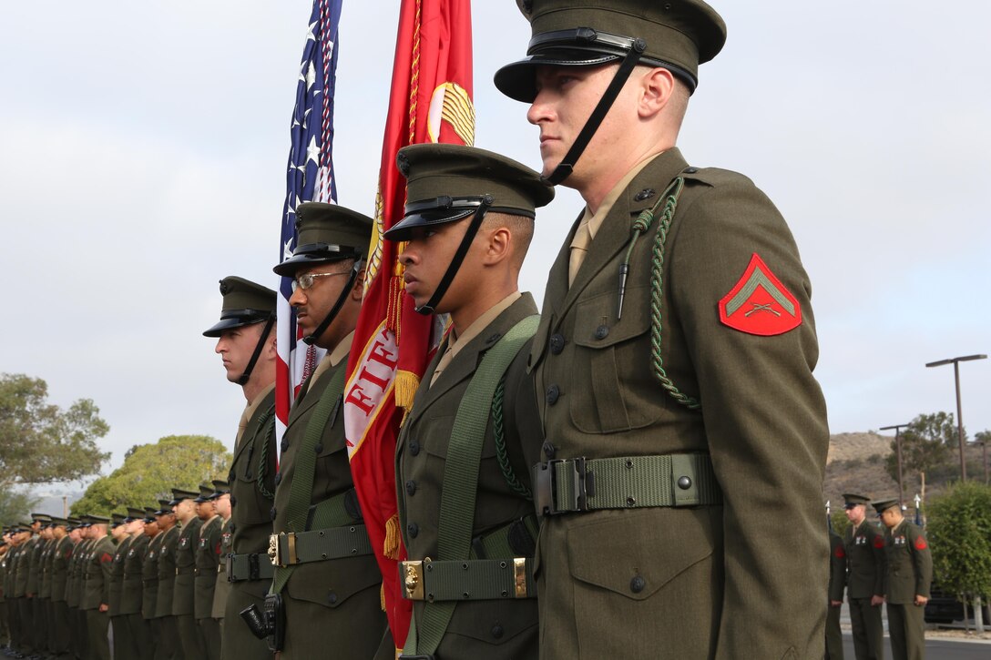 MARINE CORPS BASE CAMP PENDLETON, Calif. – A color guard with 5th Marine Regiment stands at attention during a ceremony celebrating the anniversary of the unit being awarded the French fourragere at Camp Pendleton, June 30, 2016. The fourragere was awarded in 1918 for the Marines’ bravery and now stands as a symbol of excellence to the regiment. (U.S. Marine Corps photo by Pfc. Joseph Sorci/RELEASED)