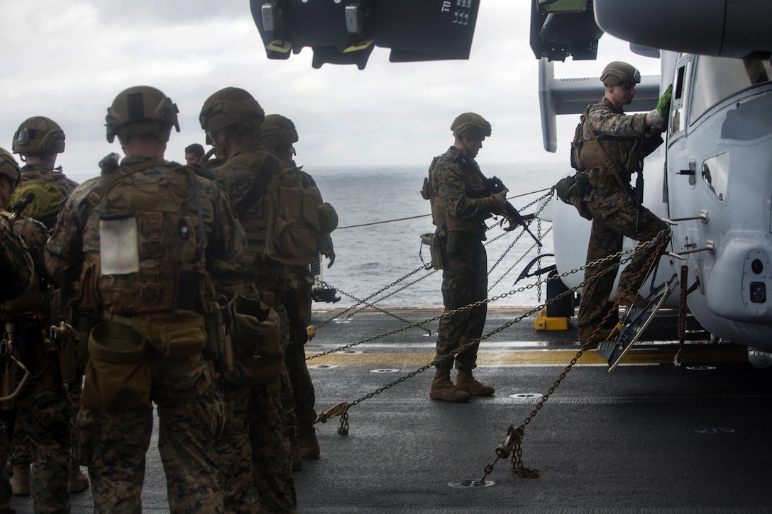 Marines board an MV-22 Osprey aircraft before conducting fast-rope training aboard the amphibious assault ship USS Wasp in the Atlantic Ocean, July 5, 2016. The Marines are assigned to Maritime Raid Force, 22nd Marine Expeditionary Unit, which is supporting U.S. national security interests in Europe as it operates in the U.S. 6th Fleet area of operations. Marine Corps photo by Lance Cpl. Koby I. Saunders
