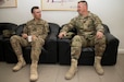 Cadet Spenser Copp, a native of Fairfax, Va. with F Company, 2nd Regiment at the U.S. Military Academy, West Point, N.Y. talks with Sgt. 1st Class Carl Addie, a Cabot, Arkansas native and the Civil Affairs Liaison Officer for Host Nation Affairs, ASG – Ku at the Kuwait Ministry of Defense, June 22. The cadet interned at Camp Arifjan, Kuwait from June 13 to July 1 as part of a unique, hands-on training opportunity hosted by U.S. Army Central’s Civil Military Operations and HNA, ASG – Kuwait.