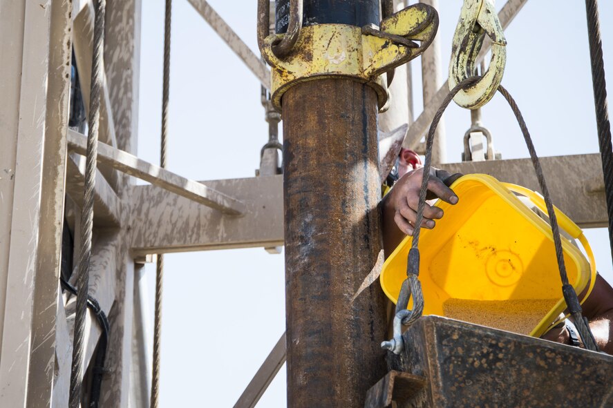 Staff Sgt. Joshua Steinwart, a well drilling technician assigned to the 557th Expeditionary Red Horse Squadron, pours sand into the well site at Al Taqaddum, Iraq, June 2, 2016. The 557th ERHS well drilling team are obtaining an organic water source for Al Taqaddum. Red Horse is helping to improve Iraq's infrastructure in support of the Government of Iraq.
(U.S. Air Force photo/Staff Sgt. Larry E. Reid Jr., Released)