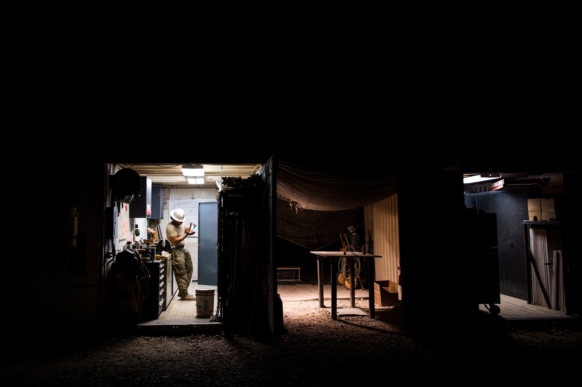 Tech. Sgt. Jason Caceres, 557th Expeditionary Red Horse Squadron's well drilling NCOIC, checks the pH levels of the water from the well site at Al Taqaddum Air Base, Iraq, June 2, 2016. The 557th ERHS well drilling team are obtaining an organic water source for Al Taqaddum. Red Horse is helping to improve Iraq's infrastructure in support of the Government of Iraq.
(U.S. Air Force photo/Staff Sgt. Larry E. Reid Jr., Released)