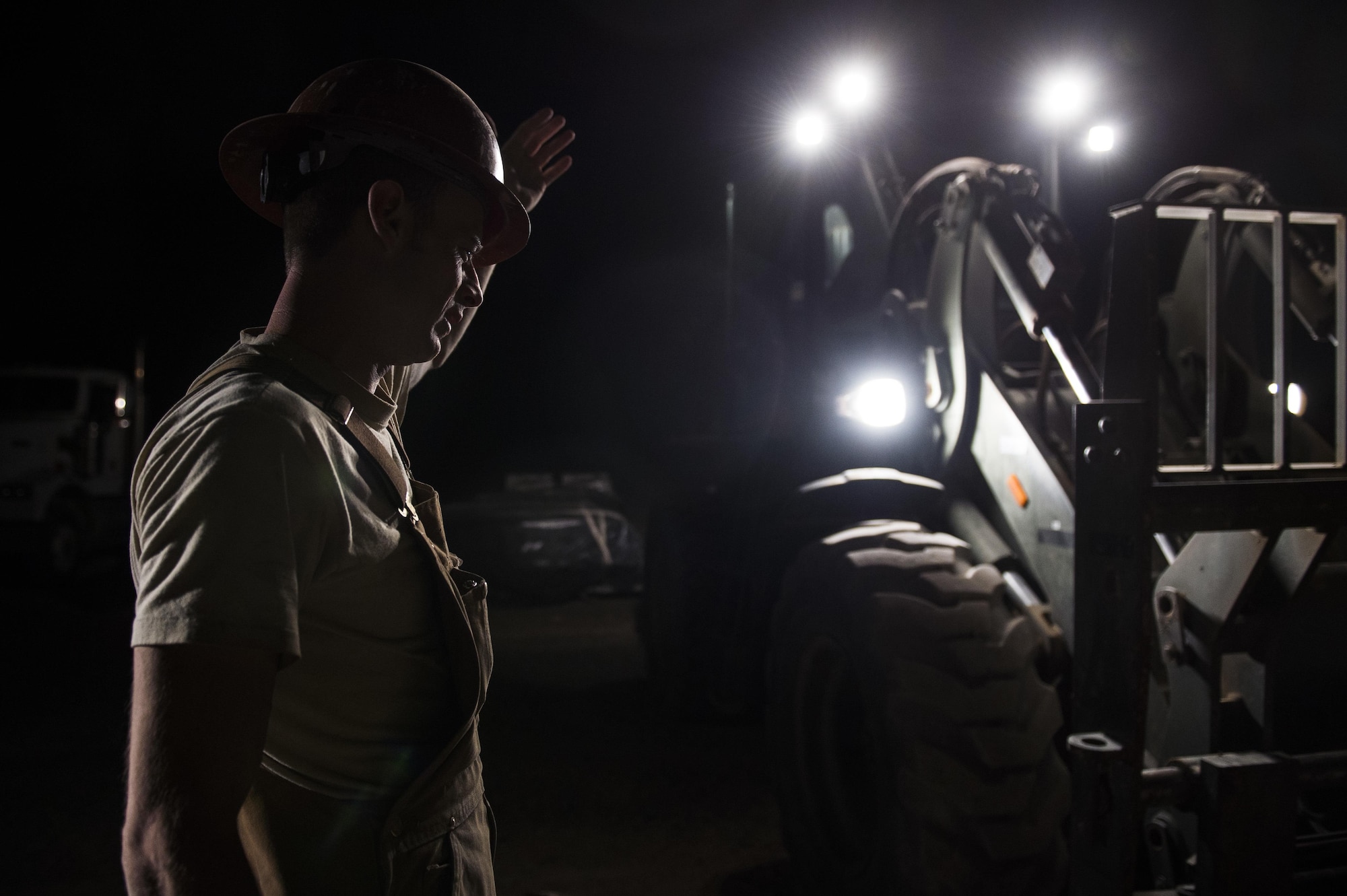 Tech. Sgt. Randy Blount, a well drilling technician assigned to the 557th Expeditionary Red Horse Squadron, guides a forklift to transport a pallet of cement at Al Taqaddum Air Base, Iraq, June 3, 2016. The 557th ERHS well drilling team are obtaining an organic water source for Al Taqaddum. They are the first Air Force entity to drill wells in Iraq.
(U.S. Air Force photo/Staff Sgt. Larry E. Reid Jr., Released)