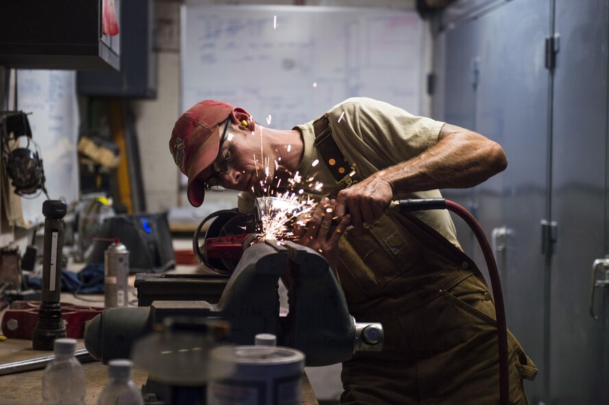 Tech. Sgt. Randy Blount, a well drilling technician assigned to the 557th Expeditionary Red Horse Squadron, trims a piece of equipment at the well drilling site at Al Taqaddum Air Base, Iraq, June 5, 2016. The 557th ERHS well drilling team are obtaining an organic water source for Al Taqaddum. Red Horse is helping to improve Iraq's infrastructure in support of the Government of Iraq.
(U.S. Air Force photo/Staff Sgt. Larry E. Reid Jr., Released)