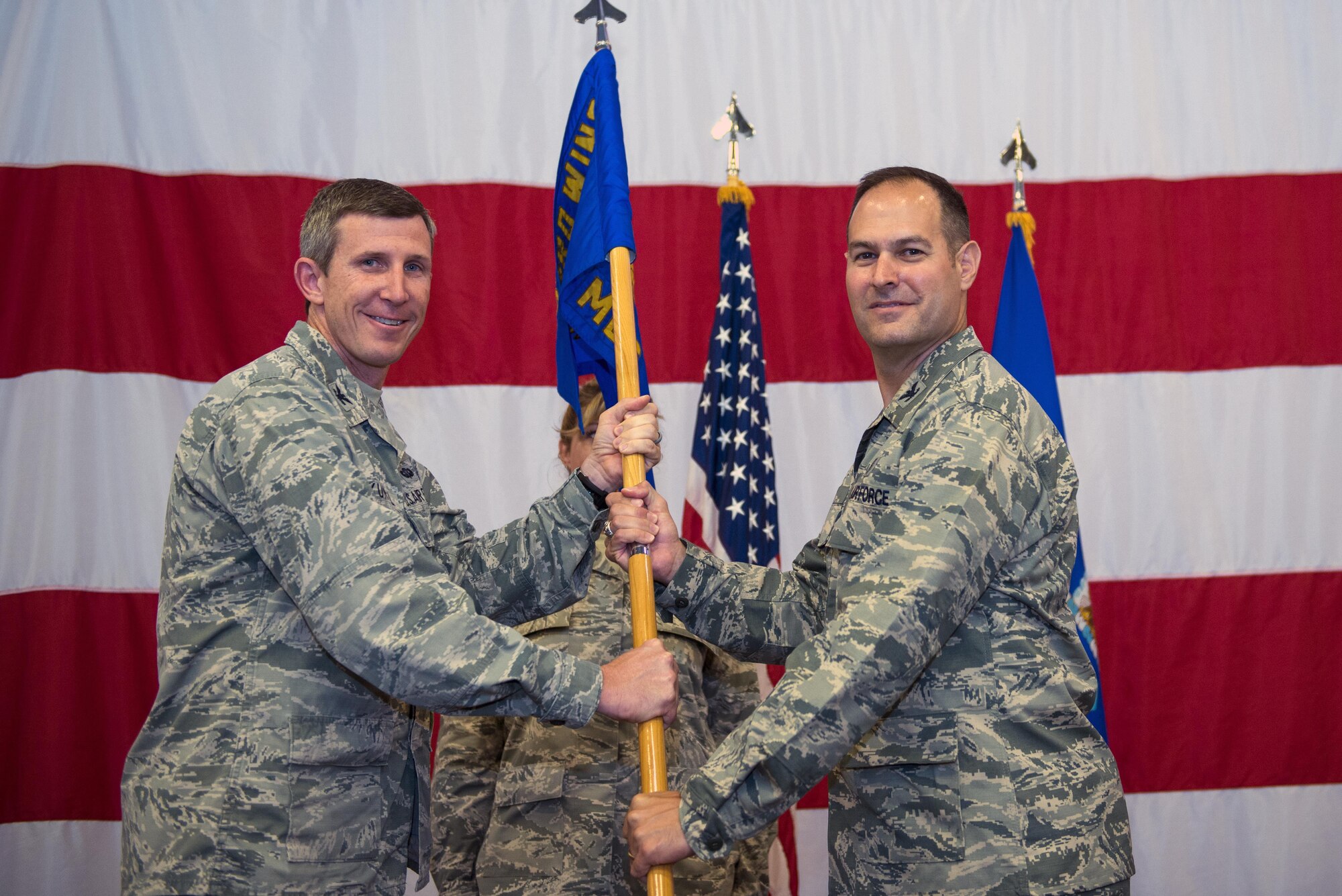 U.S. Air Force Col. Jay Vietas, right, assumes command of the 23d Medical Group, during a change of command ceremony, July 8, 2016, at Moody Air Force Base, Ga. Vietas previously served as the 48th Medical Operations Squadron commander, at Royal Air Force Lakenheath, England. (U.S. Air Force photo by Airman 1st Class Greg Nash/Released)