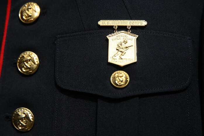 The 2016 1st Marine Division Infantry Squad Competition medal. (U.S. Marine Corps Photo by LCpl Timothy Valero)
