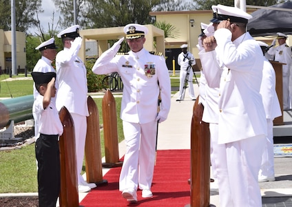 SANTA RITA, Guam (June  20, 2016) – Capt. Jeffrey M. Grimes salutes the side boys in conclusion of the change-of-command ceremony for Submarine Squadron 15 (COMSUBRON 15). Capt. David G. Schappert relieved Capt. Jeffrey M. Grimes as the commanding officer of COMSUBRON 15. (U.S. Navy photo by Mass Communication Specialist Seaman Daniel Willoughby/RELEASED)