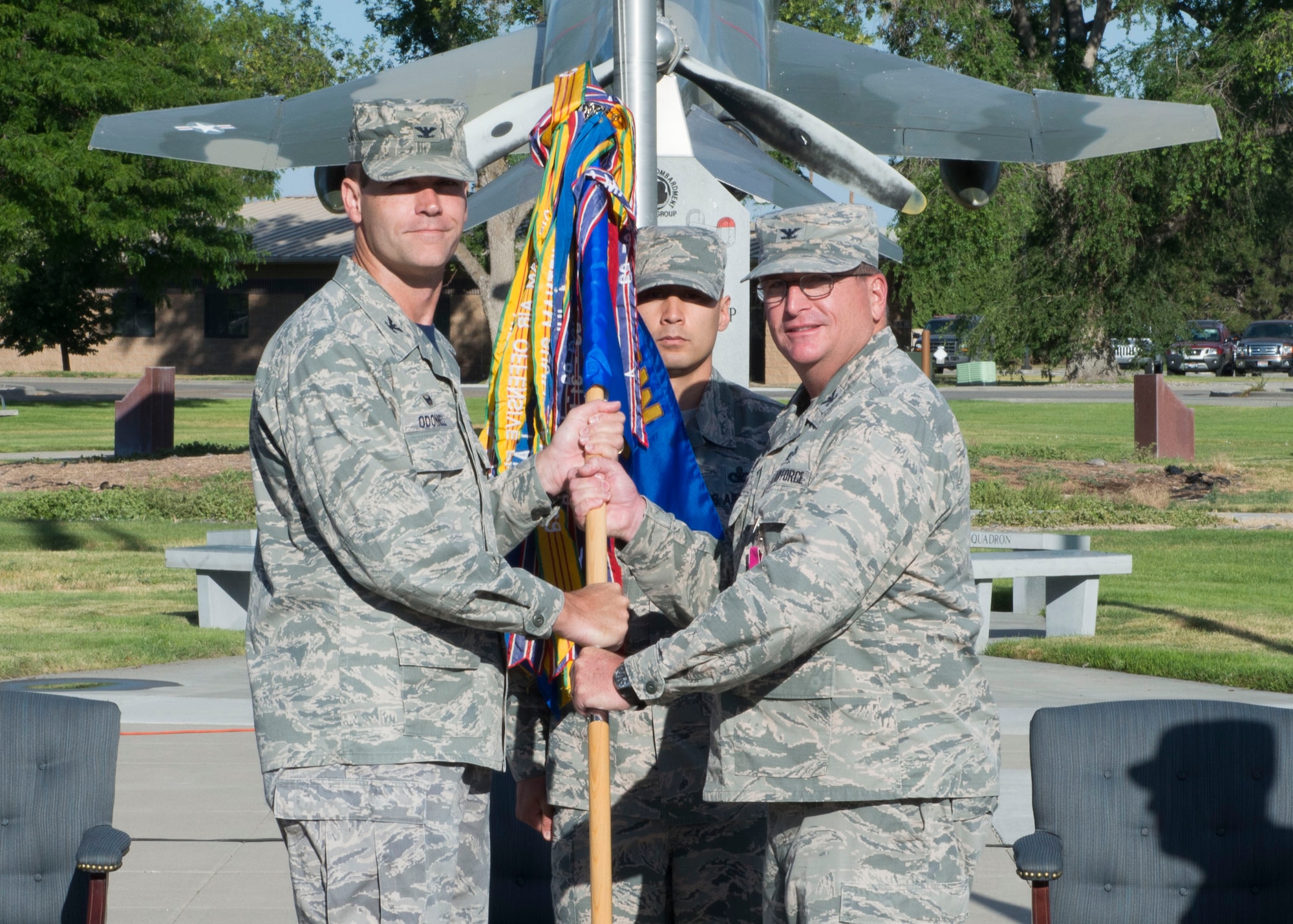 Col. Gary Kubat (right) relinquishes command of the 366th Mission Support Group to Col. Jefferson O’Donnell, 366th Fighter Wing commander, July 8, 2016, at Mountain Home Air Force Base, Idaho. Kubat will move on to work at the Pentagon. (U.S. Air Force photo by Senior Airman Malissa Lott/RELEASED)