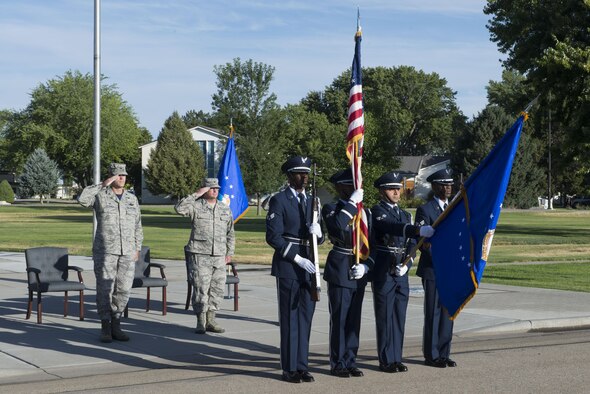 Base honor guardsmen presents the colors during the 366th Mission Support Group change of command July 8, 2016, at Mountain Home Air Force Base, Idaho. Col. Gary Kubat relinquished command of the 366th MSG to Col. John Blackwell after serving the group for two years. (U.S. Air Force photo by Senior Airman Malissa Lott/RELEASED