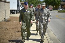 Lt. Gen. L. Scott Rice, director of the Air National Guard, walks with Lt. Col. Philip Broyles, commander of the 801st Special Operations Aircraft Maintenance Squadron, during his visit at Hurlburt Field, Fla., July 7, 2016. Rice came to Hurlburt Field to get an overview on the ANG involvement in Air Force Special Operations Command. (U.S. Air Force photo by Senior Airman Jeff Parkinson)